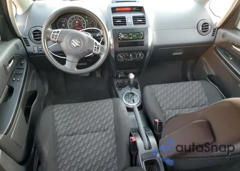 2009 Suzuki Sx4 Technology z USA, uszkodzony, nr VIN JS2YB413696203388